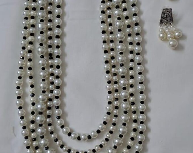 Multi layered glass pearl necklace set with matching earrings