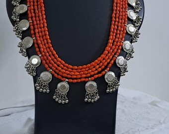 Exclusive multi layered  orange glass beads necklace set with silver oxidised charms n matching earrings