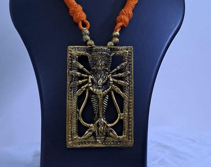 Orange thread necklace with oxidised golden durga pendant