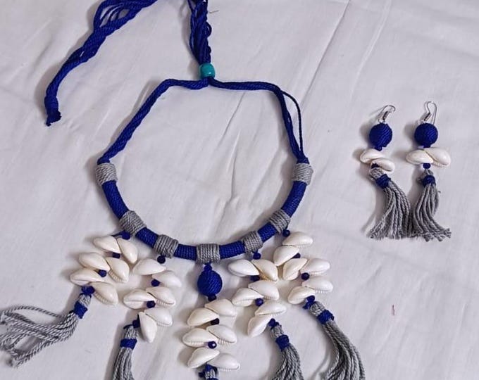 Exclusive blue n grey hasuli thread necklace set with shell fringes n matching earrings