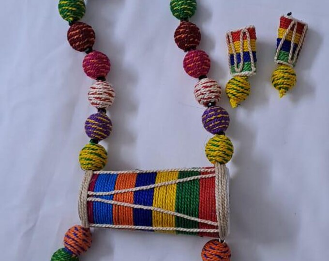 Multi coloured thread beads necklace set with dholak pendant and matching earrings