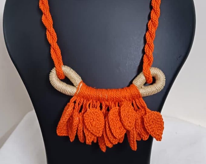 Orange Crochet thread necklace set with leaf fringes and matching earrings