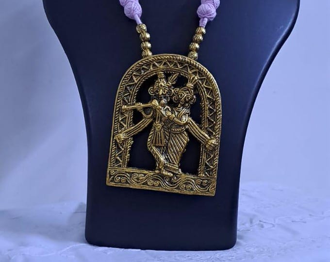 Radha Krishna golden oxidised pendant necklace in pink tread with matching earrings