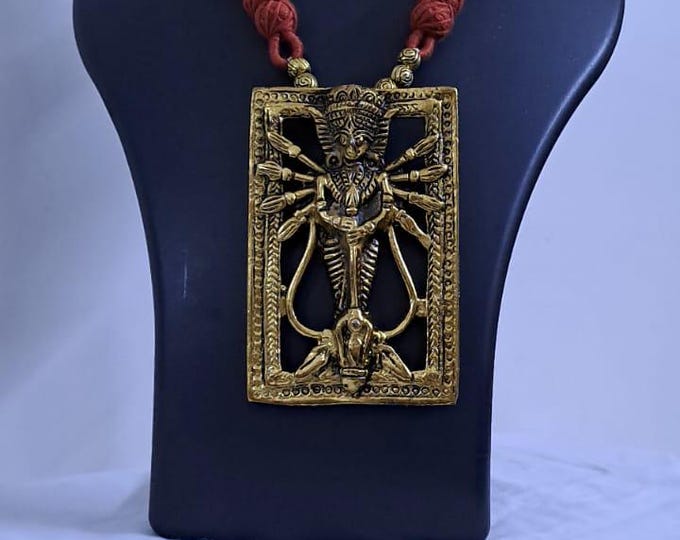Brown  thread necklace with oxidised golden durga pendant