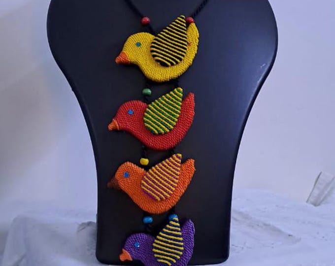 Multi coloured bird necklace and matching earrings
