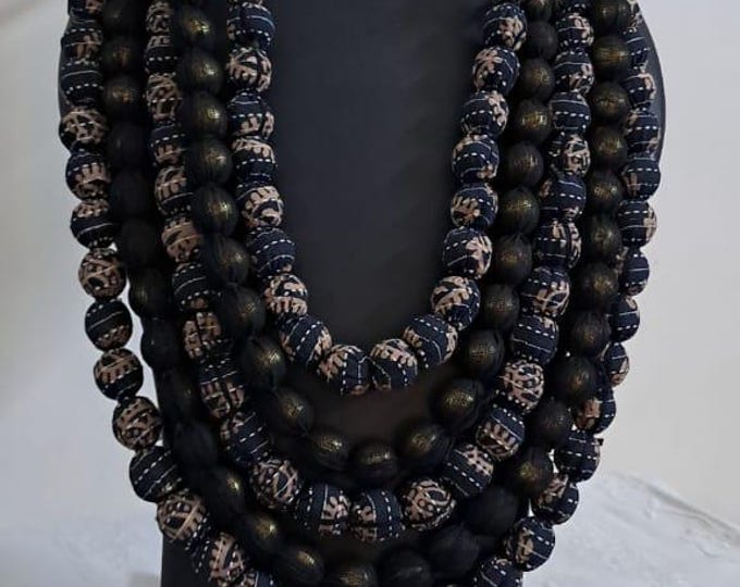 Exclusive multi-layered grey fabric necklace