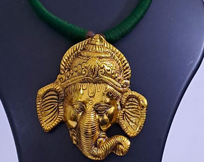 Green thread necklace with golden oxidised ganesha pendant