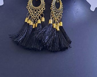 Golden neckband with black silk thread fringes and matching earrings