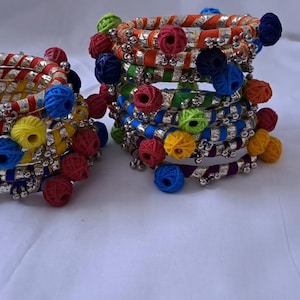Multi colour traditional zari thread bangles with cotton beads (set of 14 bangles)