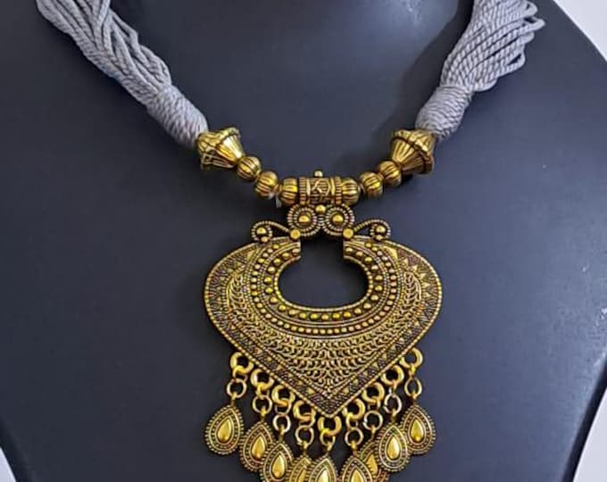 Grey thread necklace with Golden oxidised traditional pendant