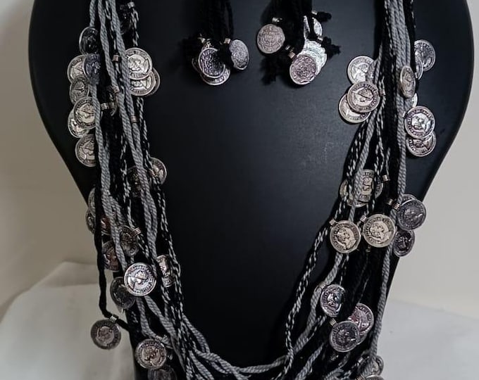 Exclusive multi-coloured and multi-layered thread necklace with silver oxidised charms