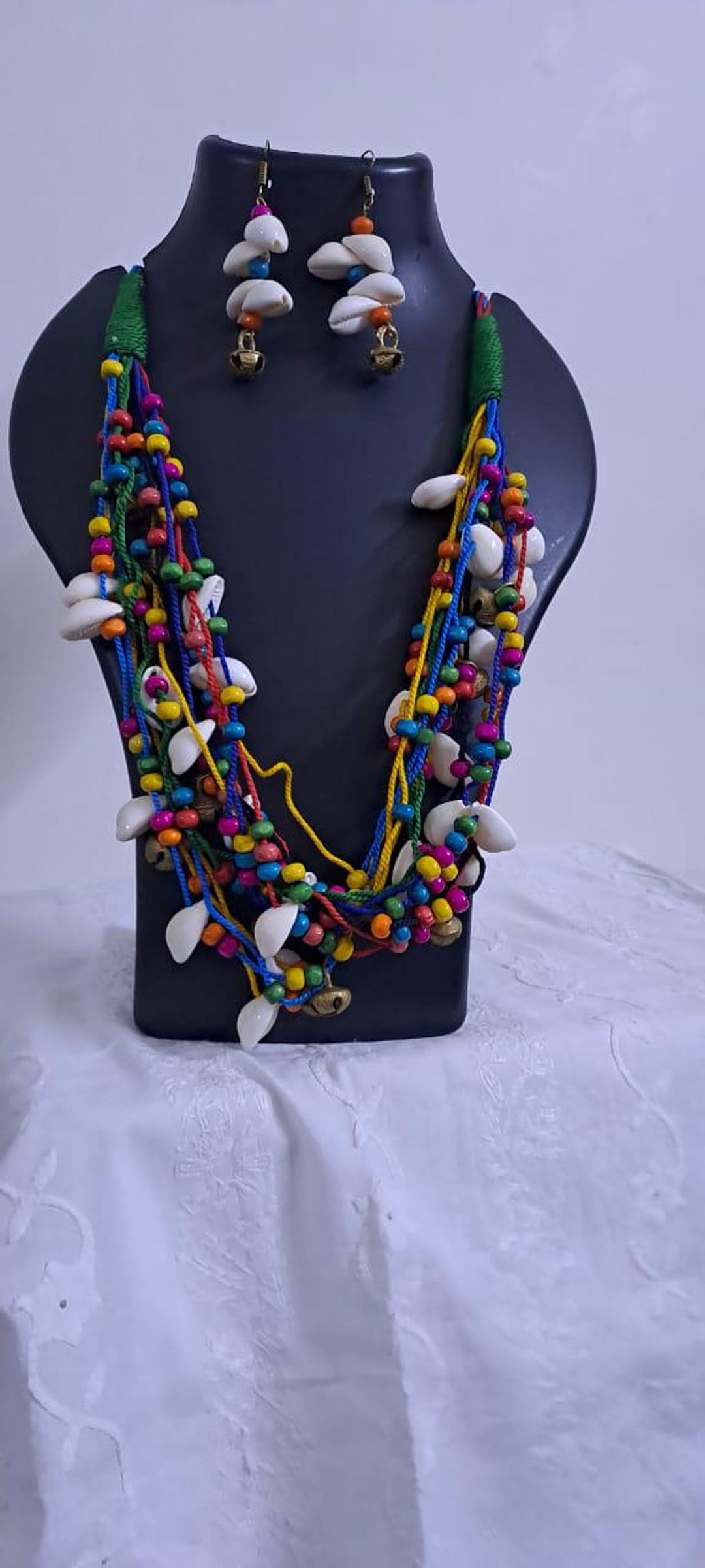 Exclusive Multi-coloured and Multi-layered Thread Necklace With Shells ...