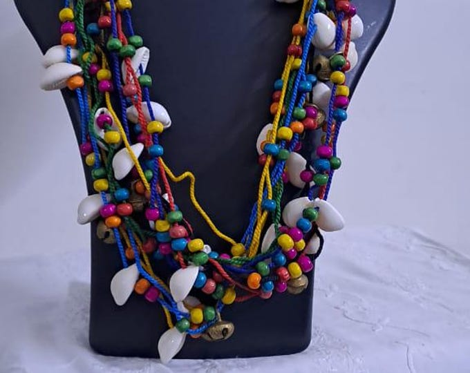 Exclusive multi-coloured and multi-layered thread necklace with shells, wooden beads n trinkets.