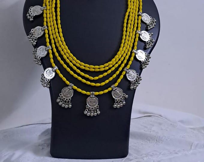 Exclusive multi layered  yellow glass beads necklace set with silver oxidised charms n matching earrings