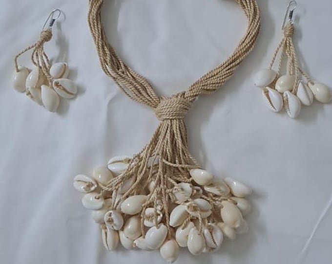 Multi layered jute necklace with shell fringes and with matching earrings.