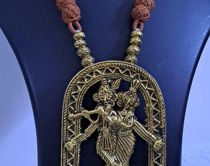 Radha Krishna golden oxidised pendant necklace in brown tread with matching earrings