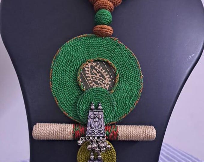 Exclusive green n brown thread beads necklace set with round thread n silver oxidised pendant n matching earrings