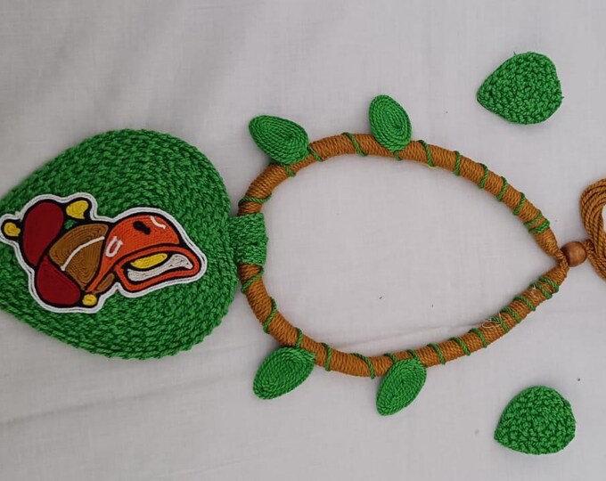 Exclusive light green and brown  thread necklace with leaf shaped  Ganesha pendant  and matching earrings.