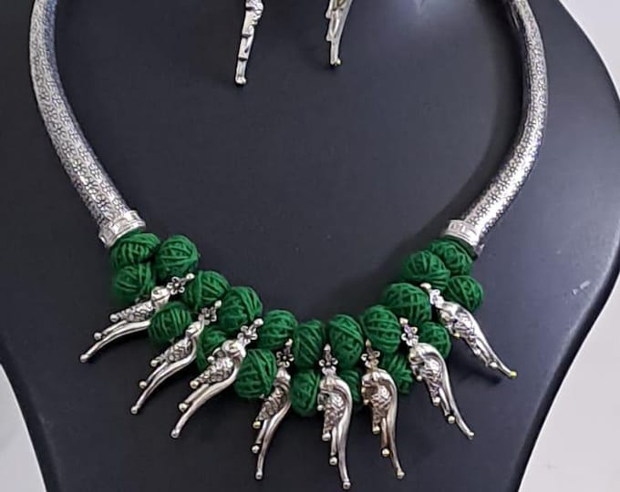Green thread necklace with kolhapuri silver oxidised traditional beads and matching earrings