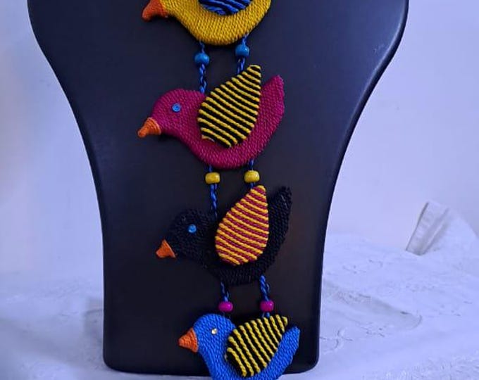 Multi coloured bird necklace and matching earrings