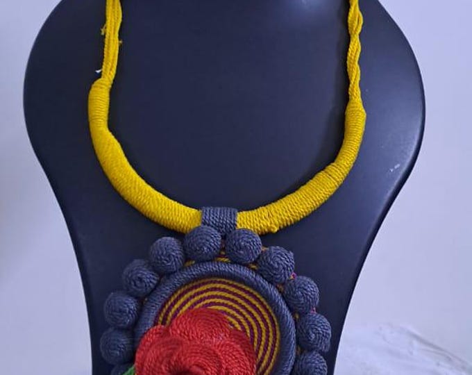 Exclusive multicoloured thread necklace set with round thread pendant n matching flower earrings