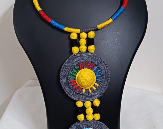 Exclusive multicoloured hasuli thread necklace set with round thread pendant n matching earrings