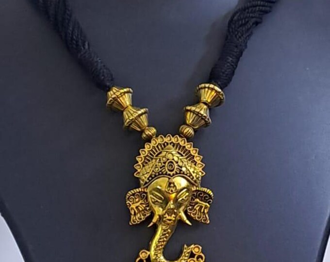 Black thread necklace with Golden oxidised traditional pendant