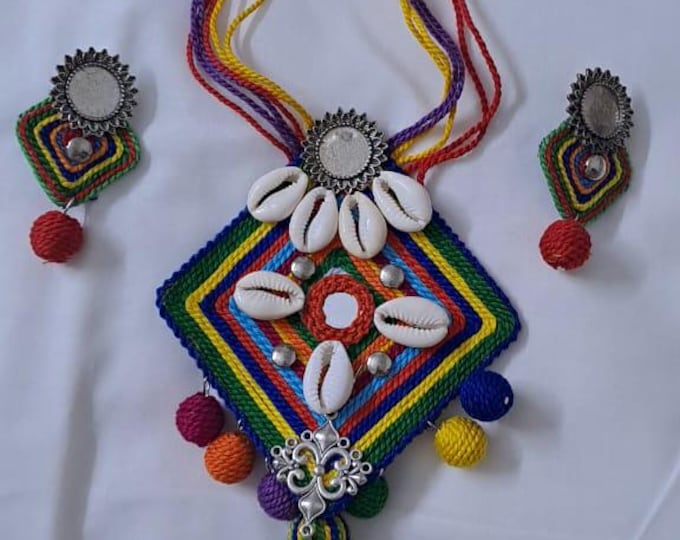 Exclusive multicoloured thread necklace set with shell n thread pendant n matching earrings