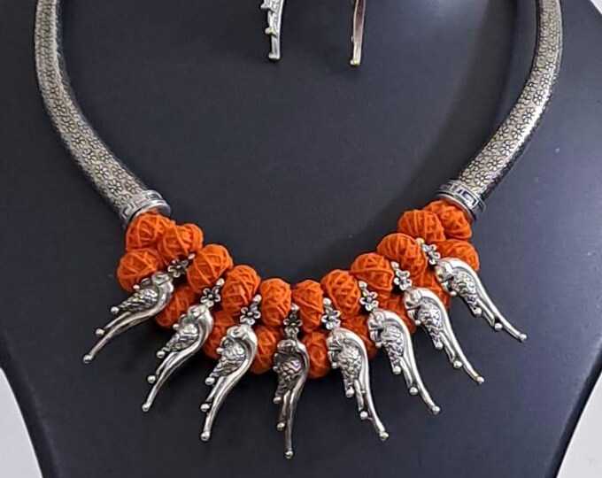 Orange thread necklace with kolhapuri silver oxidised traditional beads and matching earrings