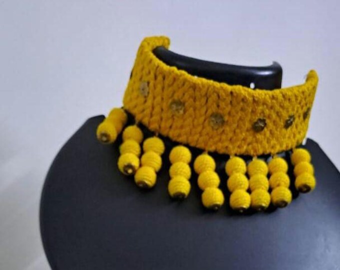 Yellow braided choker necklace set with fringes and matching earrings