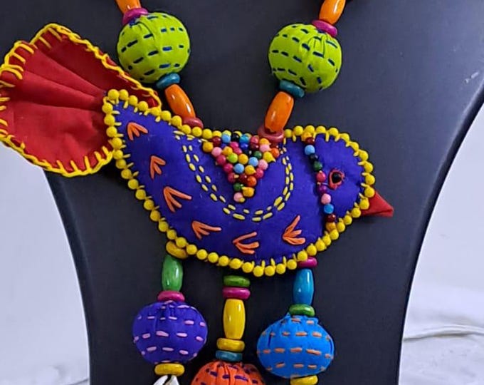 Exclusive fabric necklace with embroidered blue fabric bird pendant and fabric beads n matching beads