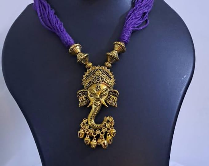 Purple thread necklace with Golden oxidised traditional pendant