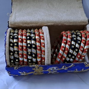 Red and black colour traditional kundan n gotta patti bangles with zari box  (set of 14 bangles)