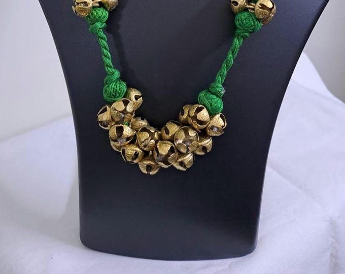 Green thread necklace set with trinkets n matching earrings