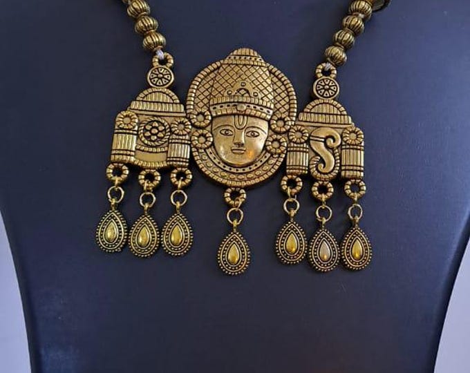 Pink thread necklace with Golden oxidised traditional pendant