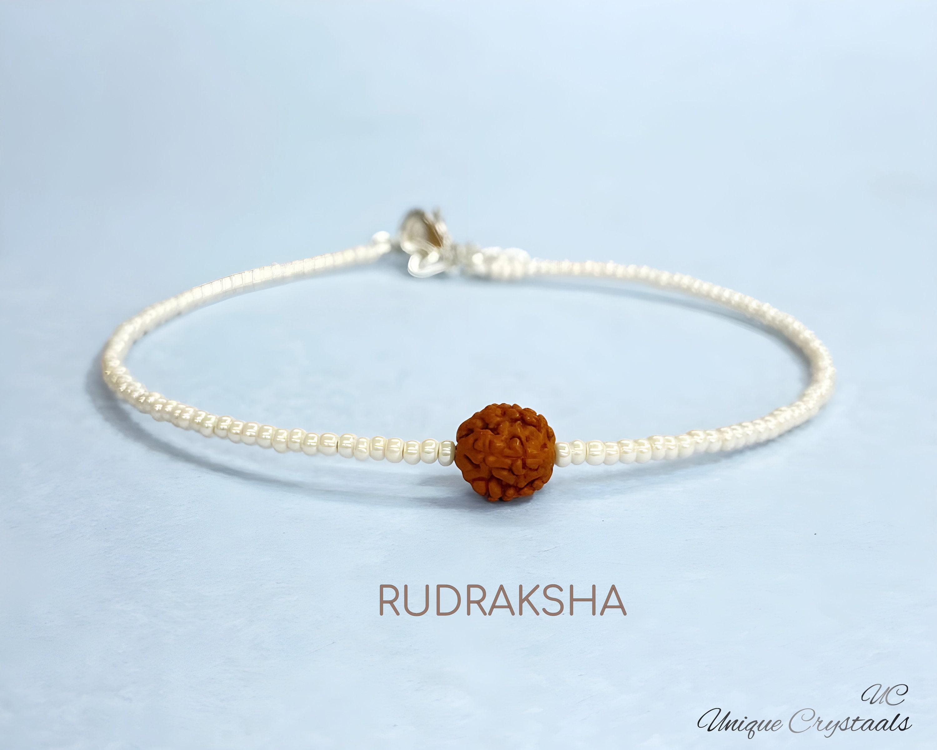 Rudraksha Silver Bracelet with Blue Swastik Single Line for Kids - Prinjal