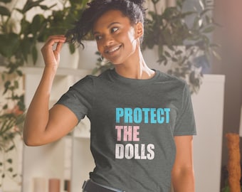 Camiseta "Protect The Dolls": Camiseta unisex feminista de derechos humanos