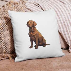 May include: White pillow with a brown Labrador Retriever illustration. The dog is sitting with its head turned to the side and wearing a brown collar with a tag.