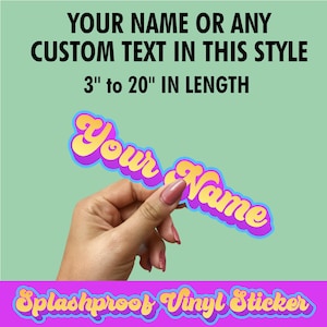 May include: A custom vinyl sticker featuring the text Your Name in a yellow font with a purple and blue outline. The sticker is available in lengths from 7.6 cm to 50.8 cm. The text reads Your Name or any custom text in this style.