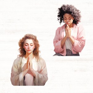 May include: Two women with long hair are shown praying with their hands clasped together. The woman on the left is wearing a light beige robe and has her eyes closed. The woman on the right is wearing a pink jacket and has her eyes open. Both women have a serene expression on their faces.