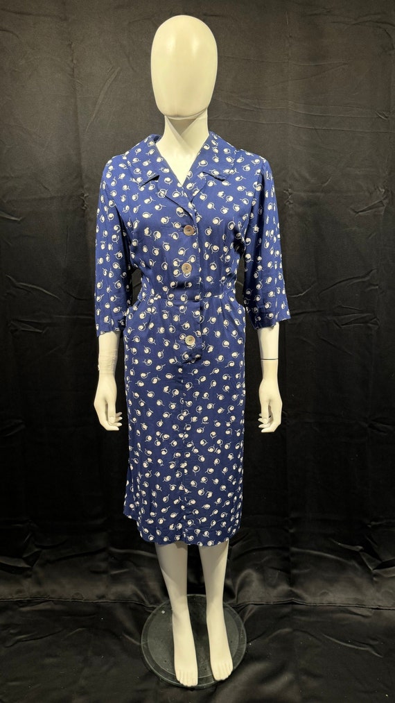 Elegant early 1950s volup dress