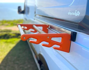 RailRack for Sprinter/Crafter - a drying rack for wetsuits and other gear. Connects to the side door rail of MB Sprinter and VW Crafter.