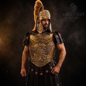May include: A Roman-style centurion armor set featuring a metallic gold breastplate with embossed eagle motifs, dark brown leather shoulder pauldrons, and a matching gold helmet with a tall tan crest. The text KNIGHTCRAFT HOUSE is visible.