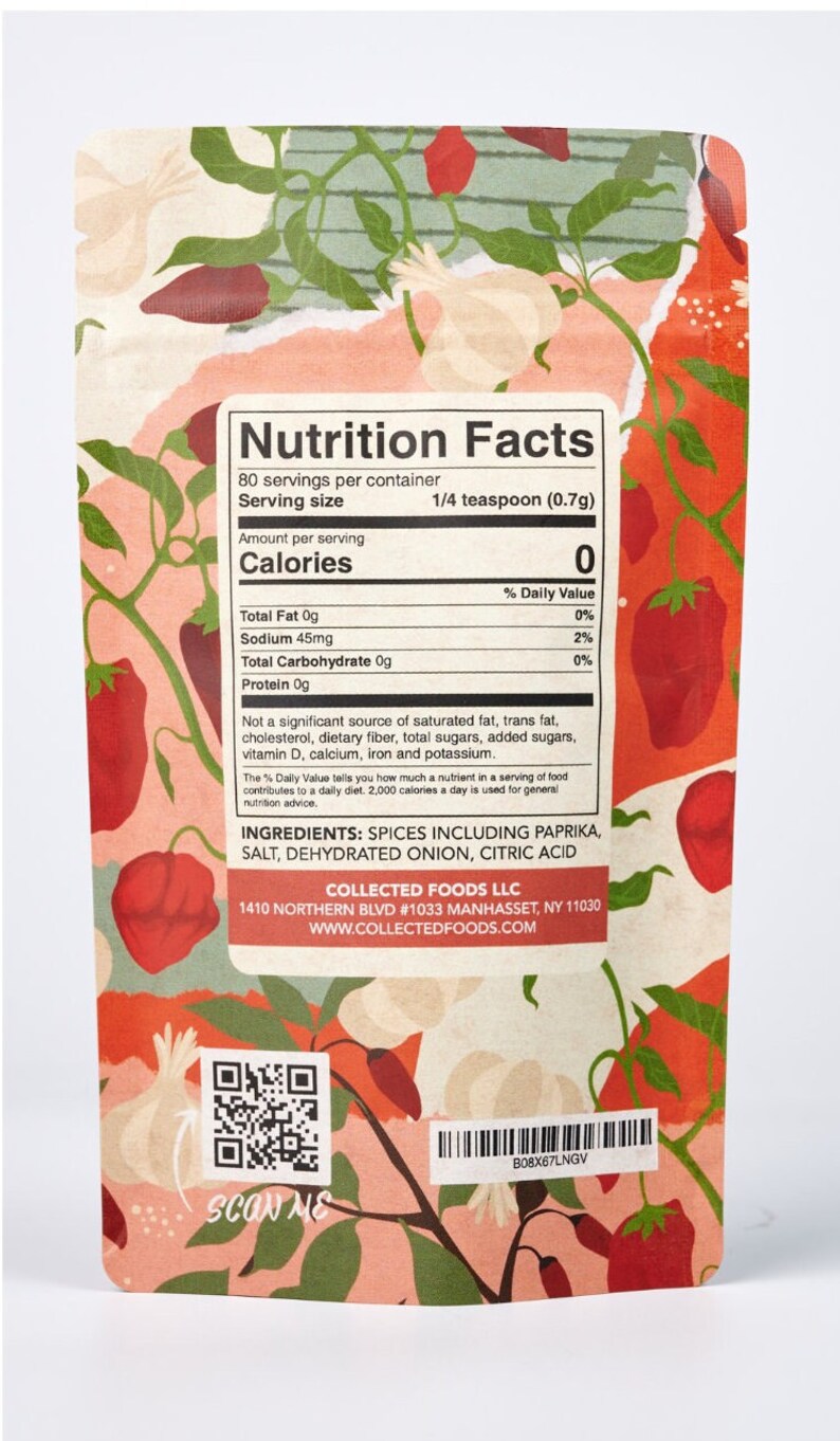 May include: Spice packet with a colorful floral design featuring red peppers and garlic. The label displays nutrition facts, including ingredients like paprika and dehydrated onion. The serving size is 1/4 teaspoon (0.7g).