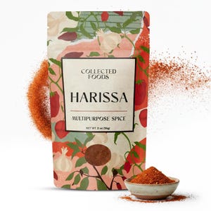 May include: A package of "HARISSA MULTIPURPOSE SPICE" from Collected Foods, with a floral design. The package contains 2 oz (56g) of spice. A small bowl of the spice and a scattering of the spice are also visible.