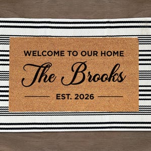 Gepersonaliseerde thuiszegen | Het Brooks vloerkleed | Welkomstbord met script | 51