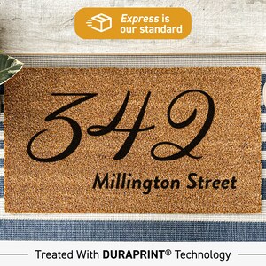 May include: A brown coir doormat with the number 342 and the text "Millington Street" in black cursive font. The doormat is treated with DURAPRINT technology.
