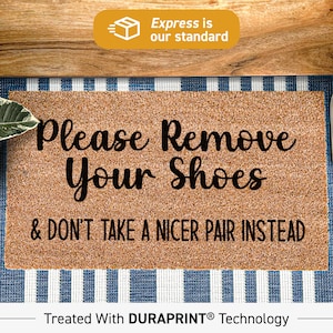 May include: A brown coir doormat with the text "Please Remove Your Shoes & DON'T TAKE A NICER PAIR INSTEAD" printed in black. The doormat is treated with DURAPRINT® technology.
