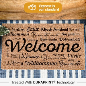 a welcome mat with the words welcome on it