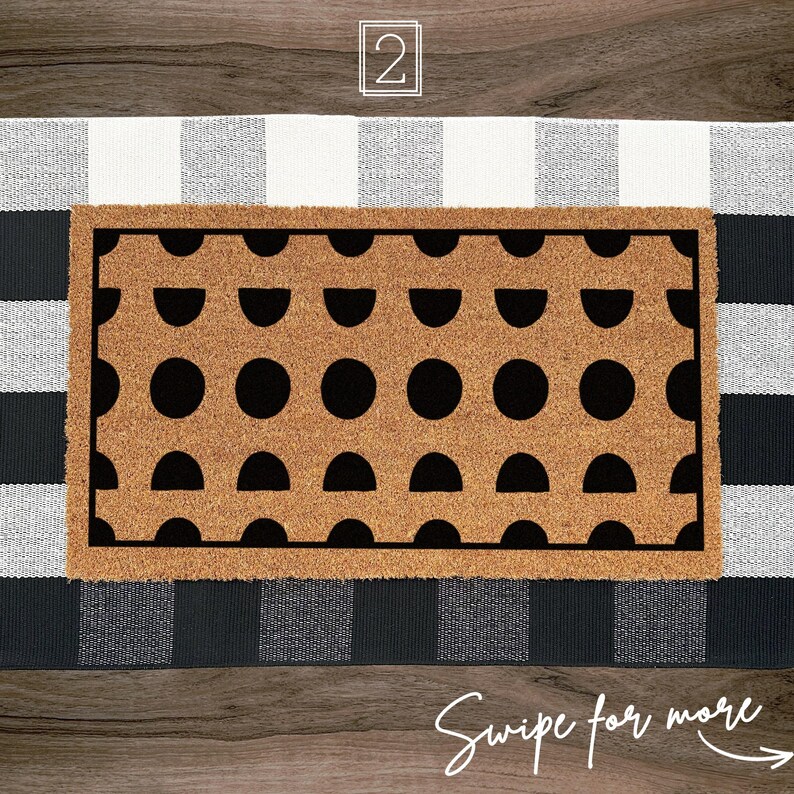 a door mat with a black and white pattern on it